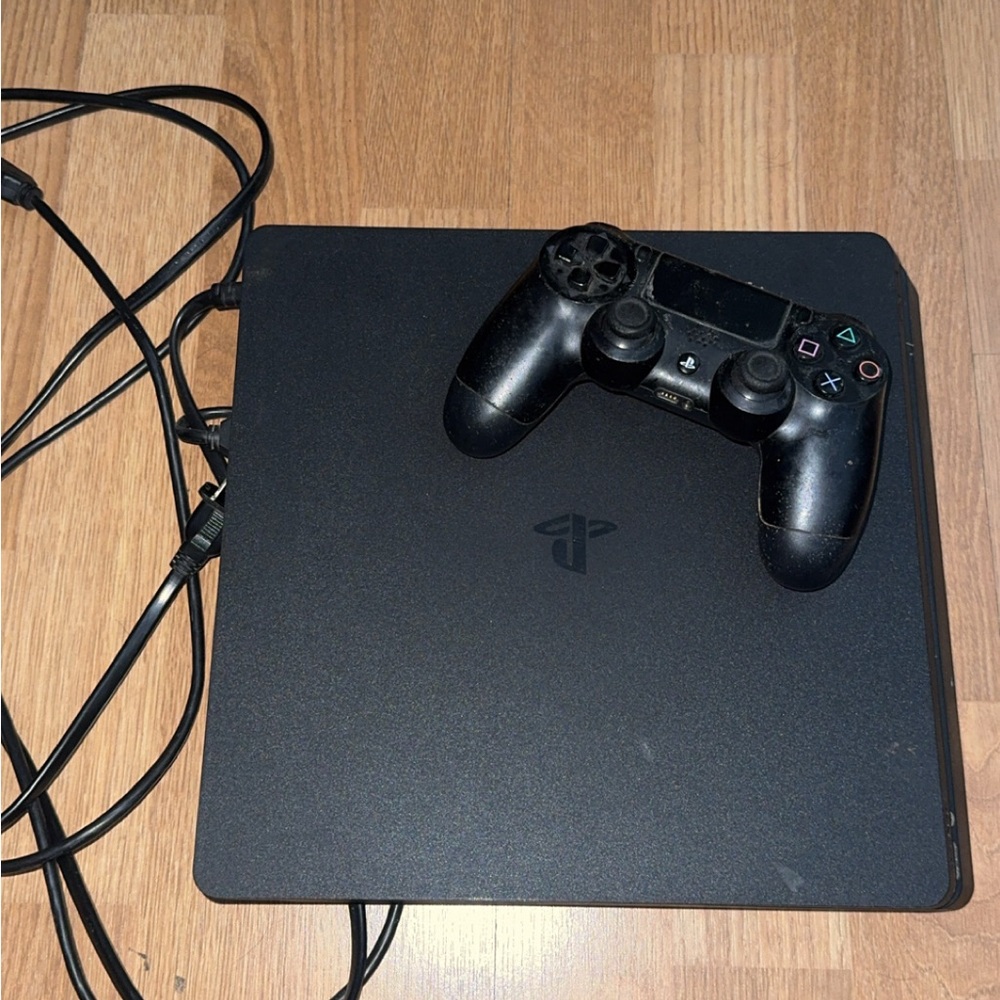 Sony Gaming Console with Black Controller